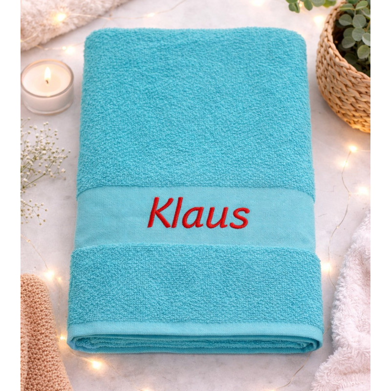 Tyrkisblå badehåndklæde  med navn på
