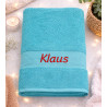Tyrkisblå badehåndklæde  med navn på