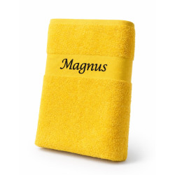 Gult badehåndklæde  med navn broderet